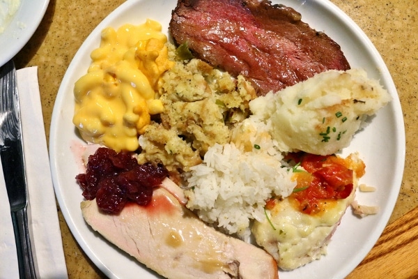 various selections from the family style meal piled onto a plate