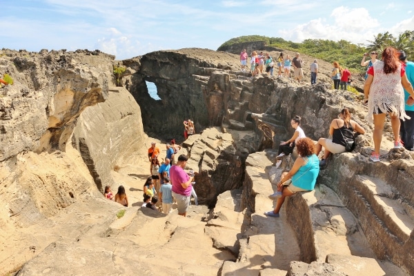 A group of people on a rocky landscape