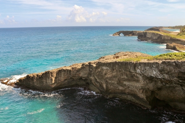 A rocky shore next to a body of water