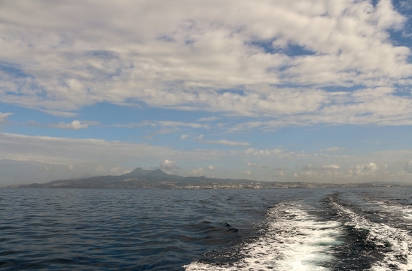 a view of Fort-de-France, Martinique way in the distance from a boat