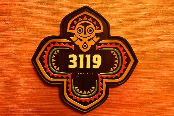 a sign displaying the hotel room number 3119