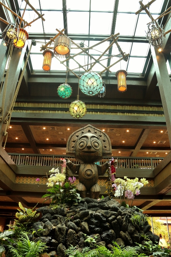 closeup of the tiki statue inside the lobby of the Polynesian resort