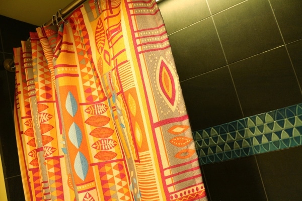 A close up of a colorful shower curtain