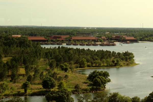 view of Disney\'s Polynesian Village Resort from across the lagoon