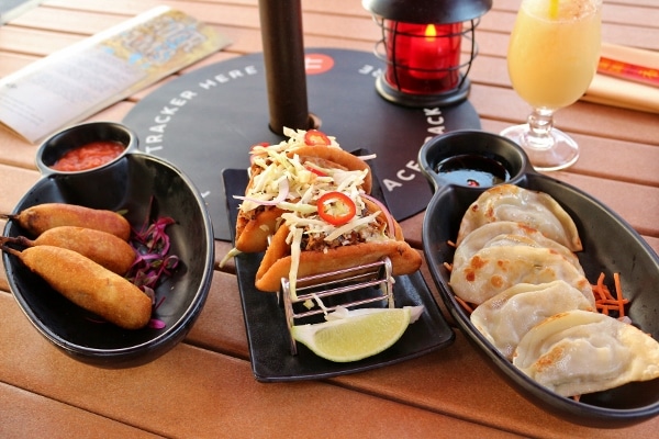 a variety of appetizers on an outdoor table