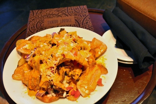 A plate of pulled pork nachos