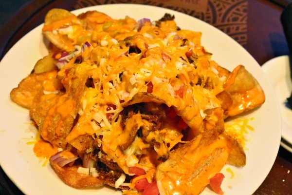 closeup of a plate of pulled pork nachos