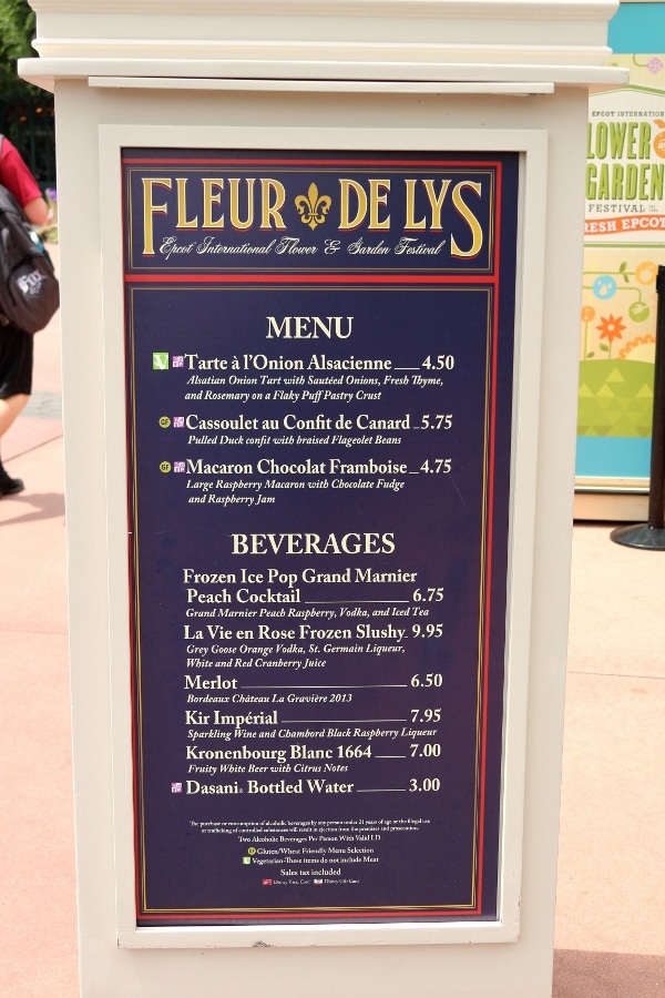 A close up of a menu for the Fleur de Lys food booth