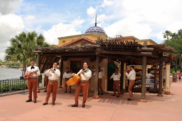 A group of people performing music outside