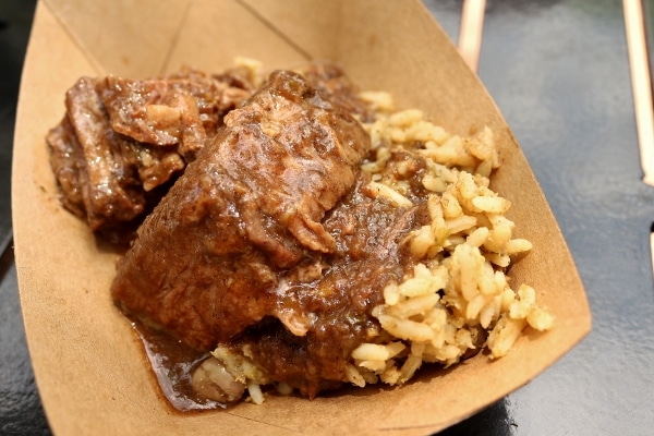 A plate of braised beef with rice