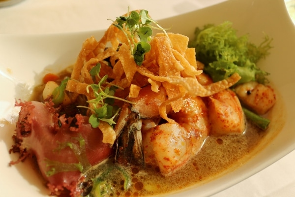 seafood topped with crispy wontons served over broth