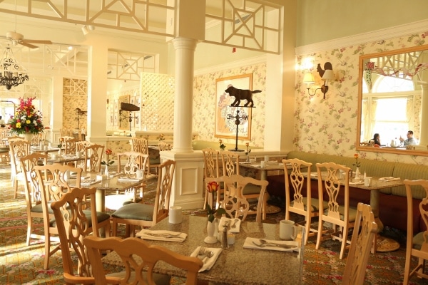 A restaurant dining room with old-fashioned floral decor