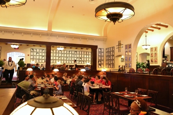 groups of people dining inside the dining room of a restaurant