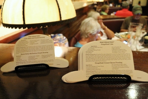 stacks of recipe cards on paper shaped like a hat