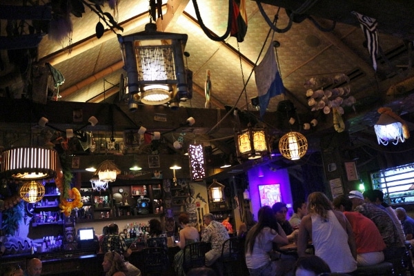 interior of a dimly lit tiki bar