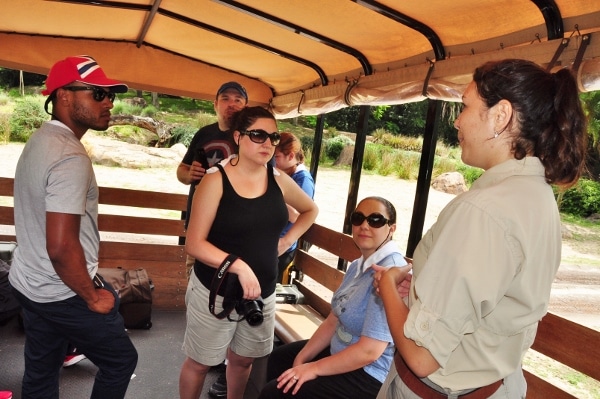 A group of people in a safari vehicle