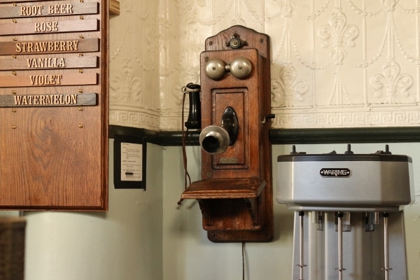 an old telephone on a wall