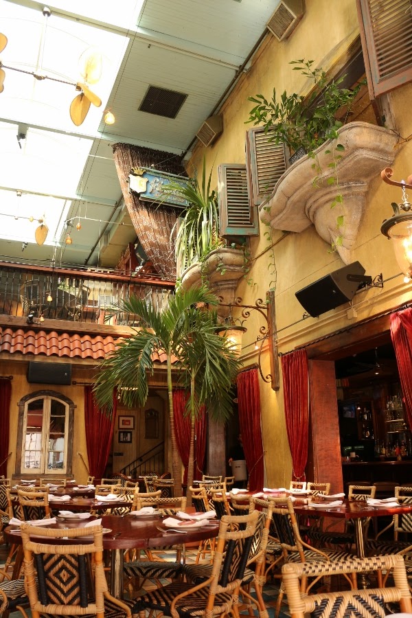 interior of a Cuban restaurant that looks like it\'s outside