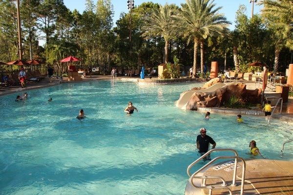 A group of people swimming in a pool