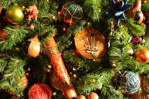 closeup of a Christmas tree with African themed decorations