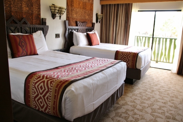 A hotel bedroom with two queen beds