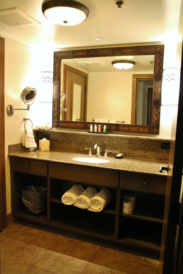 A bathroom sink and a mirror