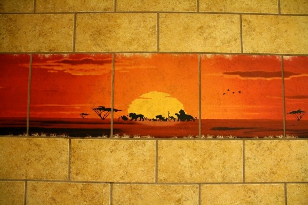 close up of bathroom tiles depicting an African sunset from The Lion King