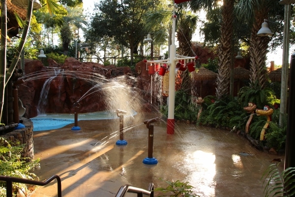 a splash area for children with lots of water spraying around