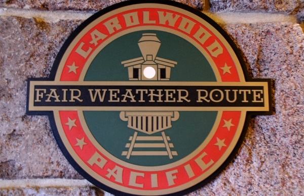 A close up of a sign that says Carolwood Pacific Air Weather Route