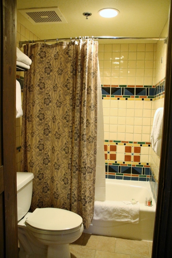 view into a bathroom with a tub and toilet