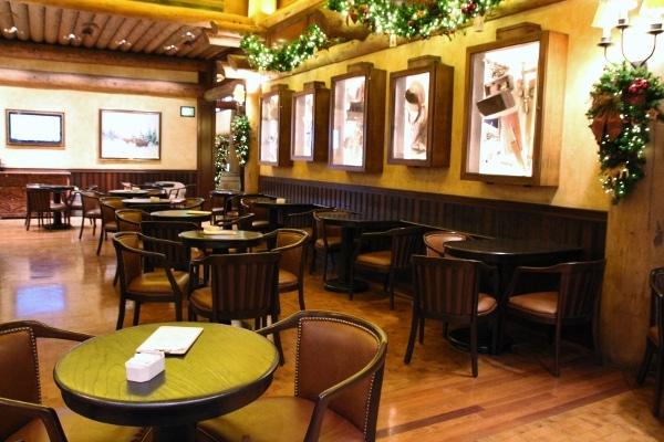 a view of lots of tables and chairs inside the Territory Lounge