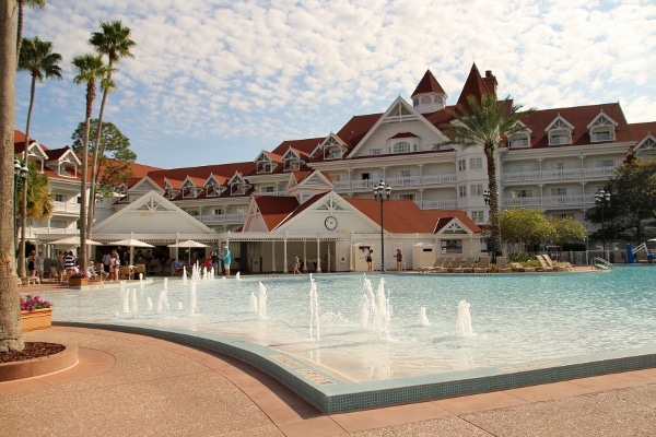 a large tranquil pool outside Disney\'s Grand Floridian resort