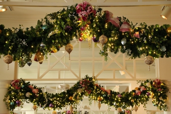 a closeup of Christmas garlands hanging from above