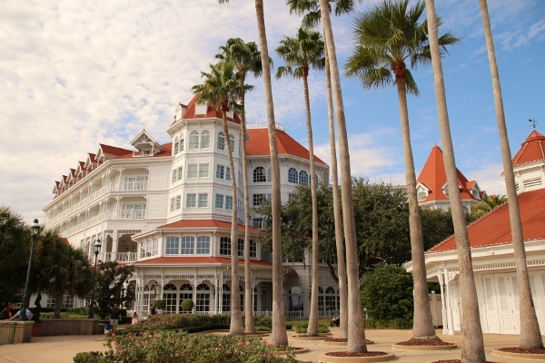 a group of palm trees outside of Disney\'s Grand Floridian Resort