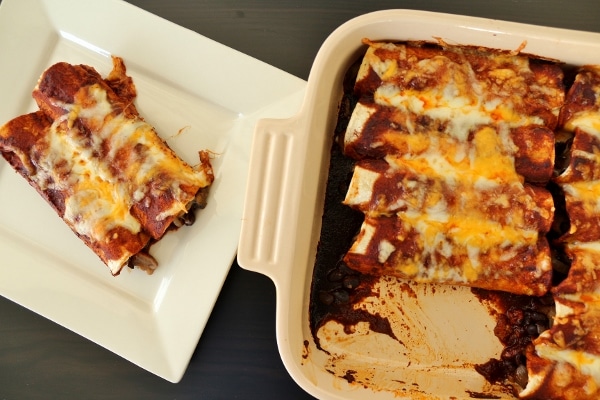 overhead view of enchiladas in a casserole dish and served on a plate