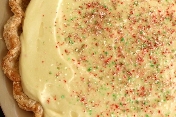 overhead closeup of a peppermint mousse pie topped with crushed peppermint candies