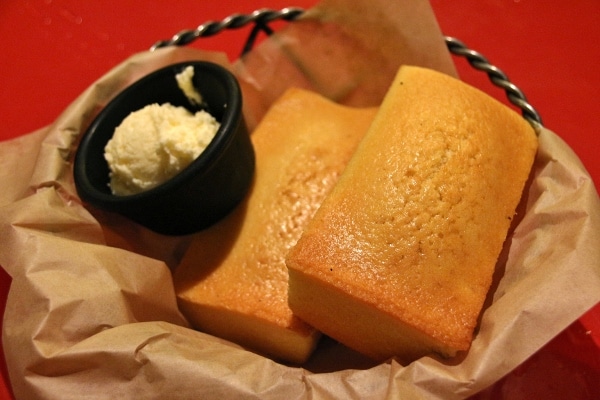cornbread and butter in a bread basket