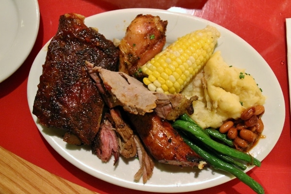 a selection of food from the skillet piled high on a white plate