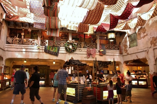 interior of Tusker House Restaurant with a buffet area, and fabric hanging from the ceiling