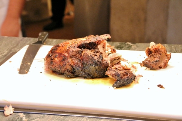 a piece of roasted meat on a cutting board