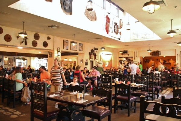 A group of people in a restaurant dining room