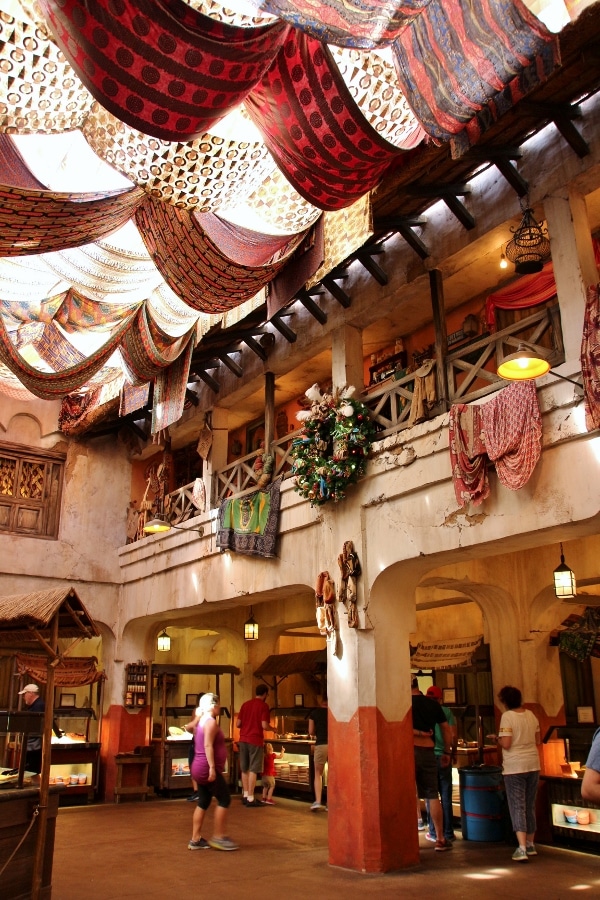 colorful interior of Tusker House Restaurant with fabric strips hanging from the ceiling