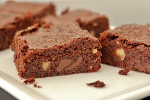 close up of brownies made with chocolate chips and walnuts