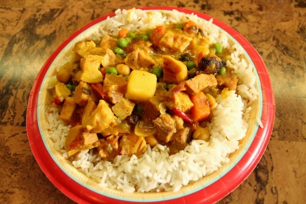 curry with vegetables served over a plate of rice