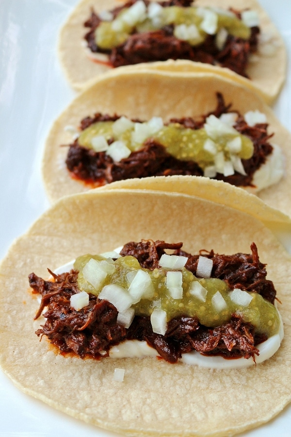 3 braised short rib tacos on corn tortillas