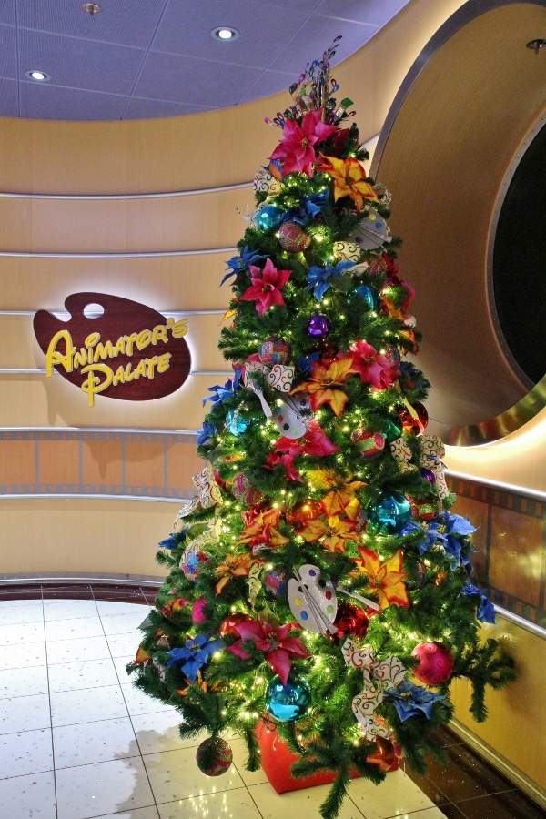 a Christmas tree next to the sign for Animator\'s Palate