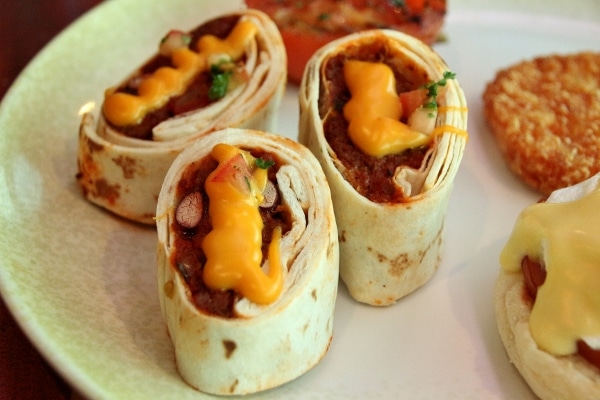 a close up of Mexican hot pockets from the Cabanas buffet on a plate