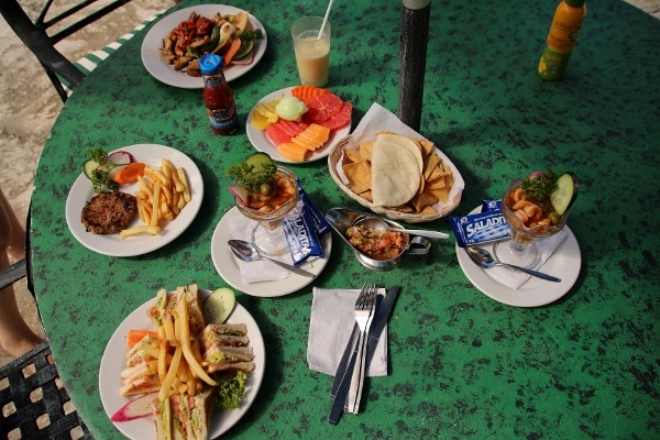 plates of food on a green table