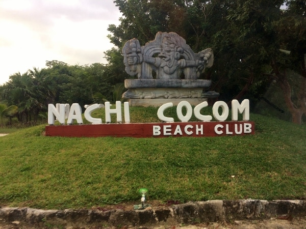 A sign that says Nachi Cocom Beach Club