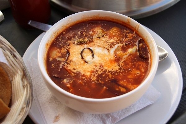 A bowl of soup on a table